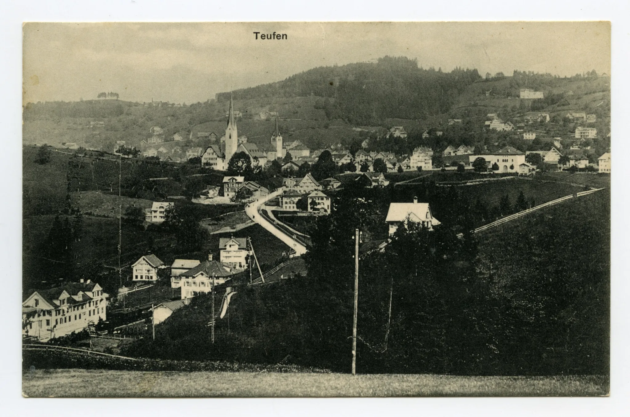 mit Neubrücke/Sammelbüel, beiden Dorfkirchen, Krankenhaus Gremm, Fernblick, Bad Sonder, Blick zu Frölichsegg, Schäflisegg (angeschnitten)